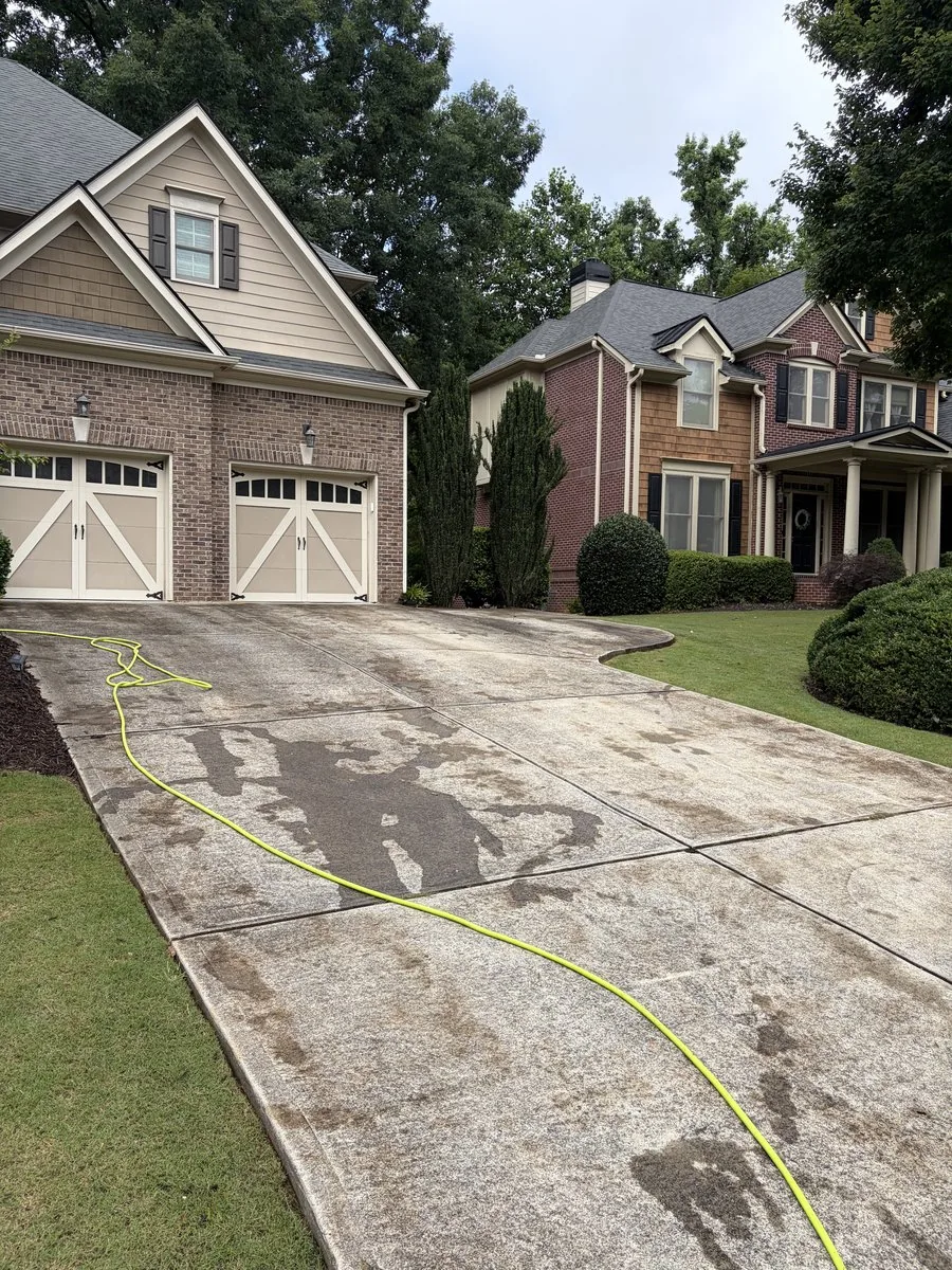 Driveway before pressure washing — dirty
